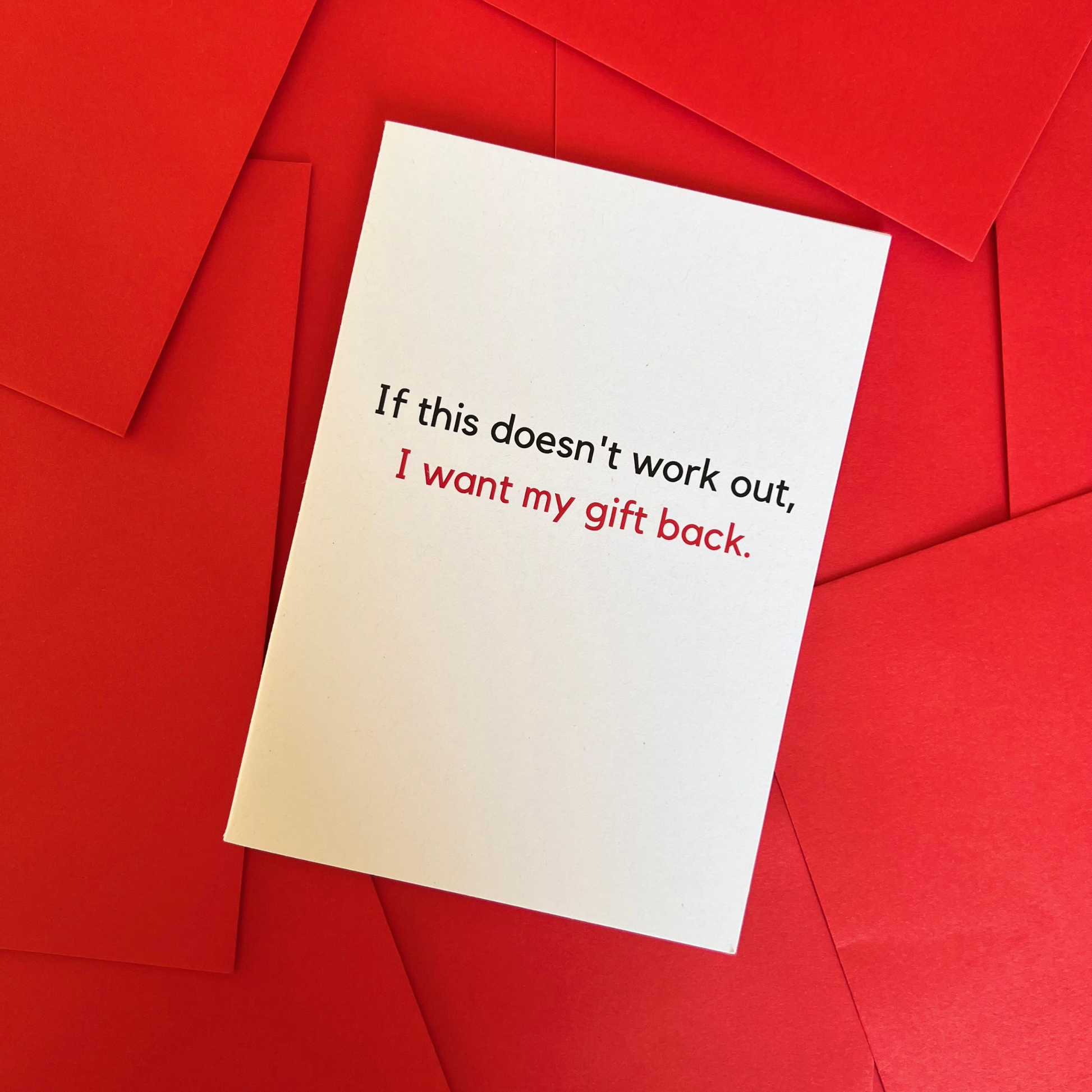 A greeting card by The Mail Minx that is white and says in black and red text "If this doesn't work out, I want my gift back."